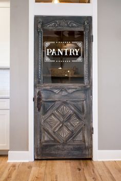 an old door with a sign on it that says patty room in front of the door