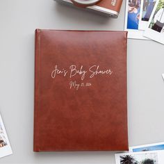 a personalized leather photo album on a table