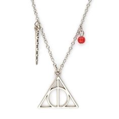 Wear your love of the Wizarding World of Harry Potter with this officially licensed pendant necklace. Whether you're attending a Quidditch match or simply adding a touch of Hogwarts magic to your everyday attire, this jewelry is sure to enchant and delight fans of all ages. Officially licensed Harry Potter collectible. Produced by SalesOne. Deathly Hallows Book, Resurrection Stone, Harry Potter Home Decor, The Elder Wand, Harry Potter Home, Costume Accessories Diy, Invisibility Cloak, Harry Potter Gift, Elder Wand