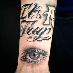 a hand with an eye and lettering on it