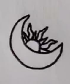 a drawing of a sun and a half moon