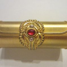 Vintage , Founder Princess Marcella Borghese, ( 1911-2002) Manufacture Of Cosmetic Co. Brass, Red Glass Cabochon. Mid Century Modern.. Mirrored , Aged In Tact. 3.5" X 1", Hinged, With Crystals. Please Review All The Close Ups. The Item Is Not New And Has Few Scratches. Nothing Is Missing, And All In Tact. Price Is Firm Compact Mirror, Red Glass, Makeup Lipstick, Red Gold, Womens Makeup, Class Ring, Century Modern, Ups, Mid Century