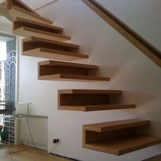 the stairs are made of wood and have no railings