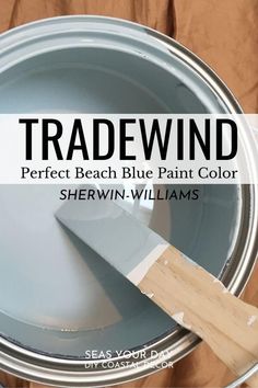 a close up of a paint pan with a spatula in it and the words tradewind painted on it