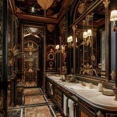 a fancy bathroom with black walls and gold trimmings on the vanity, mirrors and lights