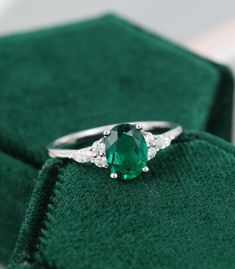 Oval Emerald engagement ring vintage 14K white gold Unique Marquise cut Diamond cluster engagement ring women Bridal Anniversary gift ITEM DESCRIPTION ✦ Handmade, high-quality item! ✦ Material: SOLID 14K/18K GOLD (can be made in white/rose/yellow gold) ✦ Center stone: Lab Emerald ✦ Size/Weight: 6*8mm Oval cut ✦ Side stones: real diamonds ✦ Total weight: 0.27 ct (High Quality) ✦ Cut - marquise Size 2*4mm ✦ Color: G-H ✦ Clarity: SI-VS ✦Or Side stones Moissanite :0.27ct ✦ Width of the gold band - 1 White Gold Engagement Rings Emerald, White Gold Emerald Engagement Ring, Emerald Engagement Ring Silver, Emerald Engagement Ring Diamond, Emerald Engagement Ring White Gold, Emerald Engagement Ring Vintage, Aquamarine Engagement Ring Vintage, Hunny Bun, Engagement Rings Emerald