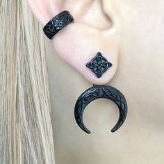 These Celtic Moon ear jacket earrings are made from stainless steel and feature intricate Celtic moon and knot design. The earrings are perfect for completing your look with a unique and timeless touch. Sold as pair Material : 316 Stainless steel Gauge: 0.7mm/23G regular piercing Size: 35mm long(edge to edge) Stud:11mm long Closure: Push pack Ships in a gift box Listing for earrings only, cuff is not included Viking Earrings, Celtic Moon, Gold Ear Jacket, Witch Earrings, Celtic Earrings, Jewelry Gothic, Front Back Earrings, Ear Jacket Earring, Gothic Earrings