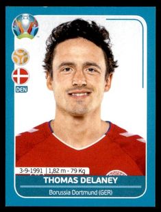 the soccer player is wearing a red jersey and smiling for the camera with his name on it