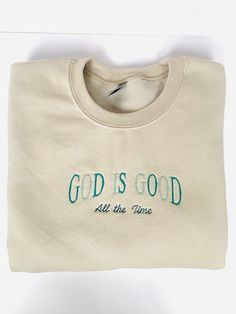 Get cozy in style with the "God is Good all the Time" Sweatshirt! This comfy long-sleeved sweater features Neutral toned colors showcasing the God is Good all the time design, making it the perfect gift for your friends, family, or yourself! So whether you're cozying up at home or stacking chairs at your local church, this sweatshirt has got your back. -Embroidered on a cotton/polyester blend crewneck sweatshirt, this design is simple and minimalistic, perfect for every outfit! -Embroidery design measures 5" x 7". -See product pictures for shirt sizing chart. -All sweatshirts are handmade on an embroidery machine so there may be slight differences, but we only sell the sweatshirts that meet our high-quality standards. -To maintain the quality of your sweatshirt and the embroidery design ma Christian Shirt Embroidery, Christian Embroidery Sweatshirt, Christian Apparel Embroidered, Christian Embroidery Designs, Christian Crew Neck Sweatshirt, Christian Apparel Sweatshirts & Hoodies