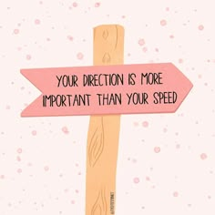 a pink sign that says, your direction is more important than your speed on it