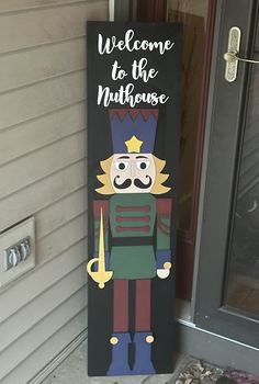 a welcome to the nutcracker door sign