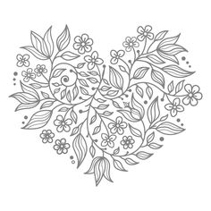 a heart shaped flower arrangement with leaves and flowers in the shape of a floral heart