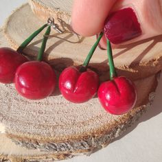 This Cherry Earrings is the cutest, one of a kind Food earrings that you have been looking for! If you want to wear cool miniature food earrings or just searching for the perfect quirky gift for her, then you have came to the right place! Make a statement with this summer earrings! D E T A I L S: * Handmade Cherry Dangle Earrings * Made from Polymer Clay * Length: 2 inches (5 cm) * Earring posts: Stainless steel * Earrings arrive nicely packed in a eco friendly box You can also add gift wrapping Cherry Jewelry, Eco Gift Wrapping, Diy Earrings Polymer Clay, Cherry Earrings, Food Earrings, Fruit Earrings, Earrings Summer, Summer Earrings, Red Cherry