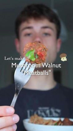 a man holding a spoon full of food with the caption let's make mushroom walnut meatballs