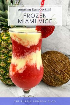 a frozen drink in a glass next to a pineapple and strawberries with the title amazing rum cocktail frozen miami vice