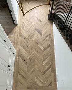 an overhead view of a wooden floor in a home