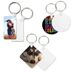 three different key chains, one with an image of a man and dog on it