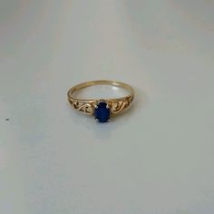 Beautiful, Simple Sapphire Ring In 10k Solid Gold. Size 7 In Excellent Condition With No Chips, Scratches, Or Signs Of Wear. Gold Sapphire Rings, Vintage Saphire Ring, Elegant Blue Sapphire Ring In 14k Gold, Blue 14k Stamped Ring Jewelry, Blue Oval Jewelry Stamped 14k, Blue Birthstone Ring Stamped 14k As Gift, Formal Blue Sapphire Ring With Birthstone, Formal Blue Sapphire Birthstone Ring, Blue 14k Gold Ring Stamped 14k