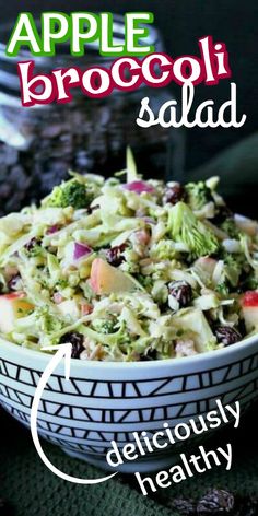 a bowl filled with broccoli salad on top of a table