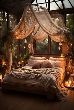 a bed with lots of lights hanging from it's headboard and canopy over it