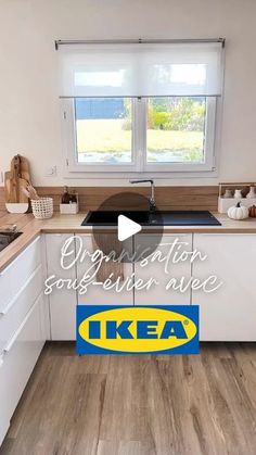 the kitchen is clean and ready to be used for cooking or cleaning up with an ikea logo