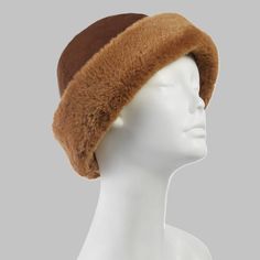 Make a statement with this adorable, water repellent hat with fabulous faux fur trim. This retro-styled hat is made with our microsuede and a cozy fleece lining. Plus the smartDri® technology repels water so you can feel comfortable and dry all day long, no matter what the winter season has in store.. If you're looking for your next go-to winter accessory, you've found it! Adjustable Brown Hats With Faux Fur Lining, Brown Hat With Faux Fur Lining And Ear Flaps, Brown Hats With Faux Fur Lining And Ear Flaps, Brown Hats With Fleece Lining For Cold Weather, Brown Sheepskin Hat With Faux Fur Lining, Winter Fur Felt Brimmed Cloche Hat, Shearling Hat With Faux Fur Lining And Ear Flaps, Winter Brimmed Fur Felt Cloche Hat, Brimmed Fur Felt Cloche Hat For Winter