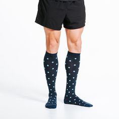 Professional and executive compression dress socks don't have to be boring...and they shouldn't only be worn at the office! Level up your work, casual, or traveling sock game in an instant with this navy blue dots pattern design. Several key features contribute to the incredible comfort and support that you will blissfully experience anytime you wear our PC Dress Socks: True Graduated Compression – promotes healthy circulation Tapered Toe Construction – for the perfect fit without hot spots or bunching in your shoes Dynamic Arch Compression –provides a secure, stable, and comfortable fit for as long as you have them on Anatomical Leg Construction – varied knitting tensions throughout the leg to provide the perfect fit and socks that will stay up all day Dots Pattern Design, Bistro Design, Socks Cute, Sock Game, Blue Dots, High Quality Dress, Hot Spots, Compression Socks, Dress Socks