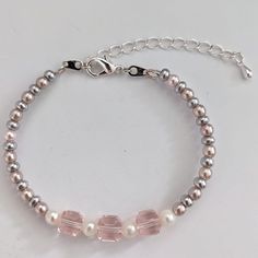 Item details 🤚 Handmade Pink or Blue memory wire bracelet features shiny pearls and majestic glass cubes (Pink bracelet) and faceted glass beads and hearts glass beads (Blue bracelet) on a silver plated memory wire bracelet, silver lobster claw and extender chain.  Each is unique in its own way.   🎀 For you, or it can be a good gift for family and friends. 💞 This Pink or Blue bracelet is about 14cm with a 6.5cm extender, approx. 8 inches maximum length. 🌸 Beads of the same colour may vary sl Phone Plug, Glass Cube, Memory Wire Bracelets, Memory Wire, Wire Bracelet, Faceted Glass, Pink Bracelet, Blue Bracelet, Blue Beads