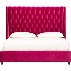 a bed with a pink headboard and white sheets on it's side, in front of a white background