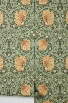 an ornate wallpaper with yellow flowers and leaves on green background, in the style of william & elizabeth