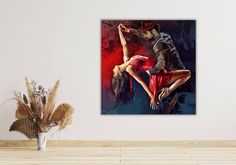 a painting of two people dancing together on a wall