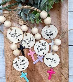 wooden cross ornament with personalized names on them