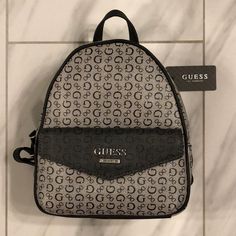 Women’s Guess Mini Backpack Price Is Firm At $60. Color: Gray/Black Condition: 10/10 New W Tags Mochila Guess, Guess Backpack, Vegan Leather Backpack, Guess Logo, Quilted Backpack, Browning Logo, Guess Bags, Convertible Backpack, Bags Logo