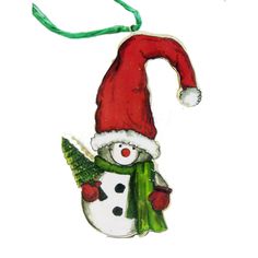 a snowman ornament with a red hat and green scarf hanging from it's side