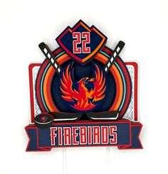 there is a sign that says firebirds with hockey sticks and pucks on it