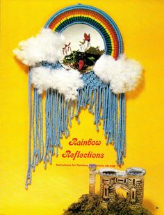 an advertisement for the san francisco toy factory, with clouds and rainbows on it