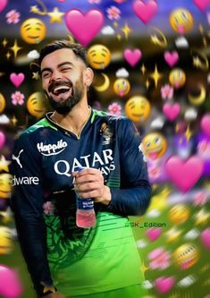 the man is holding a bottle in his hand and smiling at the camera while surrounded by hearts