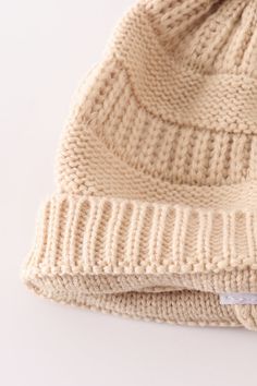 Stay warm and stylish with our Beige Pompom Cable Beanie! The perfect accessory to complete any cozy look, this beanie features a chic beige color and playful pompom. With its cable knit design, it provides both warmth and charm. Say goodbye to boring headwear and hello to this quirky beanie! 100%Acrylic Kids: 17.5*18cmAdult: 20*20.5cm HAT-052 Cozy Beige Crochet Knit Hat, Beige Soft Knit Hat, Cozy Beige Knit Crochet Hat, Beige Knit Beanie, Cozy Beige Crochet Beanie Hat, Cute Cream Soft Knit Hat, Cozy Beige Beanie, Beige Knitted Beanie, Beige Knit Beanie For Cold Weather