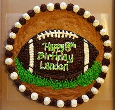 a birthday cake with a football on it