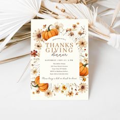 a thanksgiving party card with flowers and pumpkins