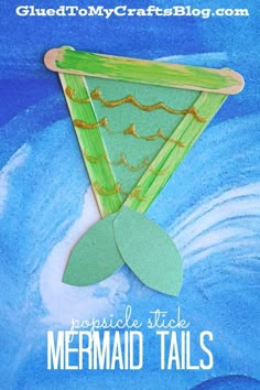 the paper mermaid tail craft is made with glue and wood sticks, which are used to make