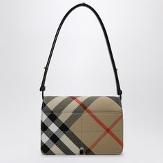 Find BURBERRY Vintage Check Shoulder Bag on Editorialist. This Burberry shoulder bag is crafted from Vintage check coated canvas and features leather trim. The bag has an adjustable leather shoulder strap, front flap with magnetic closure, one exterior pocket, and one interior pouch pocket. The bag also features side lettering logo and gold-tone metal hardware. The dimensions of the bag are 23 cm x 16 cm x 8 cm. The adjustable shoulder strap length is 50 cm - 100 cm. The bag is made of 65% Polyester, 35% Cotton, with a 100% Lambskin lining and Calf leather details. Burberry Shoulder Bag, Burberry Vintage, Beige Bag, Gold Bag, Lettering Logo, Bags Logo, Canvas Shoulder Bag, Metal Hardware