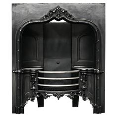 an ornate fireplace with black paint on it