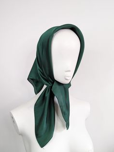 Green satin headscarf Luxury modern bohemian satin headscarf. This is made from a soft synthetic blend satin fabric. The fabric is luxurious and lightweight. This scarf is versatile and can be worn in many ways around the neck or head. It is large enough to be tied around the head to give full coverage, or to be draped around the neck.  This is a square scarf that can be folded to create the triangle look, or wrapped up and tied in a knot to be worn as a headband. Style: Head scarf Measurements: Green Headscarf, Green Head Scarf, Bandana Hair Wrap, Style Head Scarf, Head Scarf Vintage, Satin Head Scarf, Style Bandana, Bandana Hair, Cape Costume