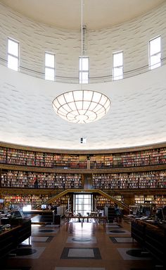 the inside of a library with lots of books