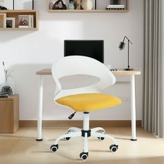 a white desk with a yellow chair in front of it and shelves on the wall