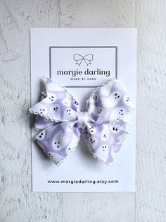 Darling 5" Halloween grosgrain moonstitched ribbon bow!  You can pick the hardware you want, the headbands are very stretchy and one size fits most!!  I am always happy to try and accommodate custom orders if you have something in mind that you don't see in my shop, send me a message and I'll do my best!! I AM NOT RESPONSIBLE FOR  WRONG ADDRESSES ON YOUR PART  LOST, STOLEN, DAMAGED PACKAGES DUE TO TRANSIT  Thank you for stopping by! Tie Packaging Ideas, Tie Packaging, Halloween Purple, Grosgrain Ribbon Bows, Toddler Bows, Newborn Headband, Headband Hair, Purple Lavender, Newborn Headbands