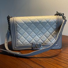 Timeless And Iconic Large Boy Bag With A Unique Twist From The Chanel Collection. This Rare And Beautiful Bag Features An Ombr Beige And Gray Color, Diamond Quilted Leather, Antique Silver Hardware, The Signature Cc Boy Crossbody Lock On The Front And An Adjustable Chain Strap With Leather Shoulder Padding That Can Be Used As Two Shoulder Straps Or As One Shoulder Strap. The Interior Is Made Entirely Of Grosgrain Fabric In Gray And Includes An Interior Flat Pocket With Zipper. Condition: Excelle Designer Gray Rectangular Shoulder Bag, Designer Gray Satchel Bag, Luxury Gray Rectangular Satchel, Luxury Gray Satchel Bag, Luxury Gray Shoulder Bag With Silver-tone Hardware, Luxury Gray Bag With Palladium Hardware, Luxury Gray Shoulder Bag, Classic Gray Rectangular Bag, Classic Gray Rectangular Bags