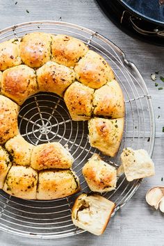 a bundt cake on a wire rack with slices cut out and ready to be eaten