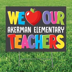 a sign that says we love our akerman elementary teachers on it in the grass